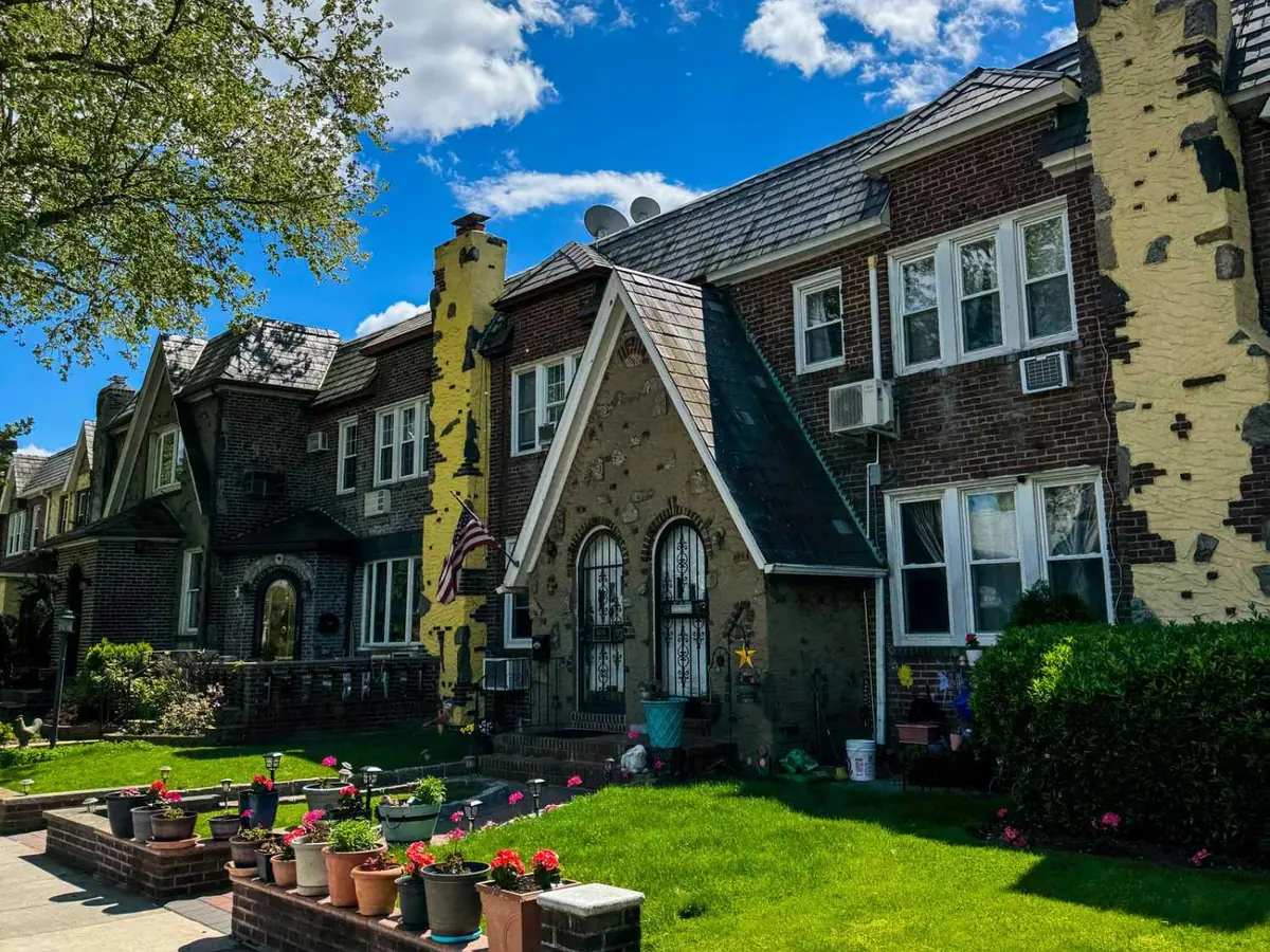 Older homes on a tree-lined residential street