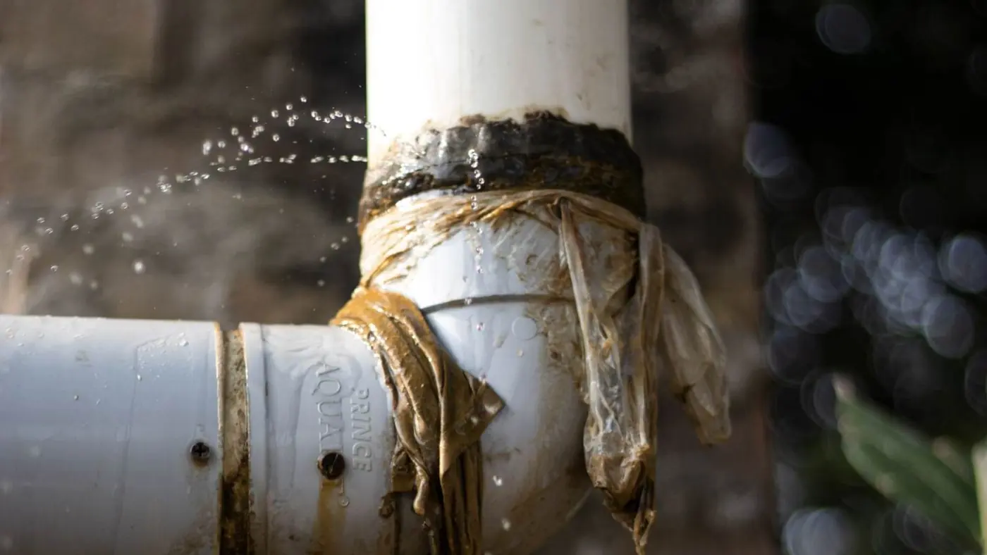 Water dripping from a failed pipe joint